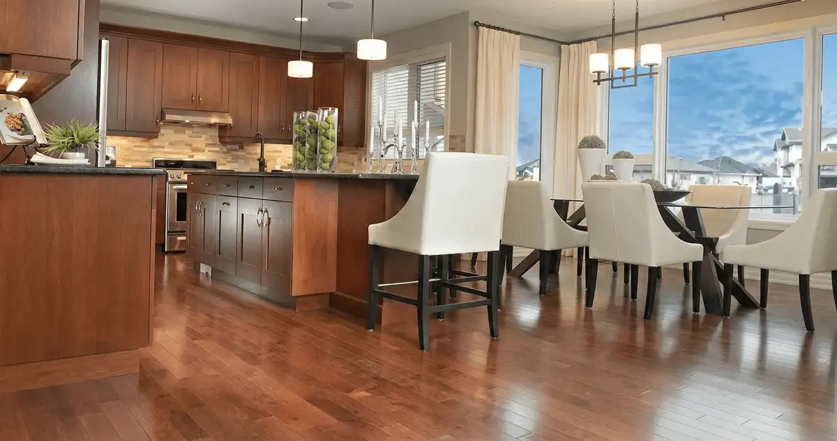 A modern kitchen with professionally installed wood flooring in Jackson, MS